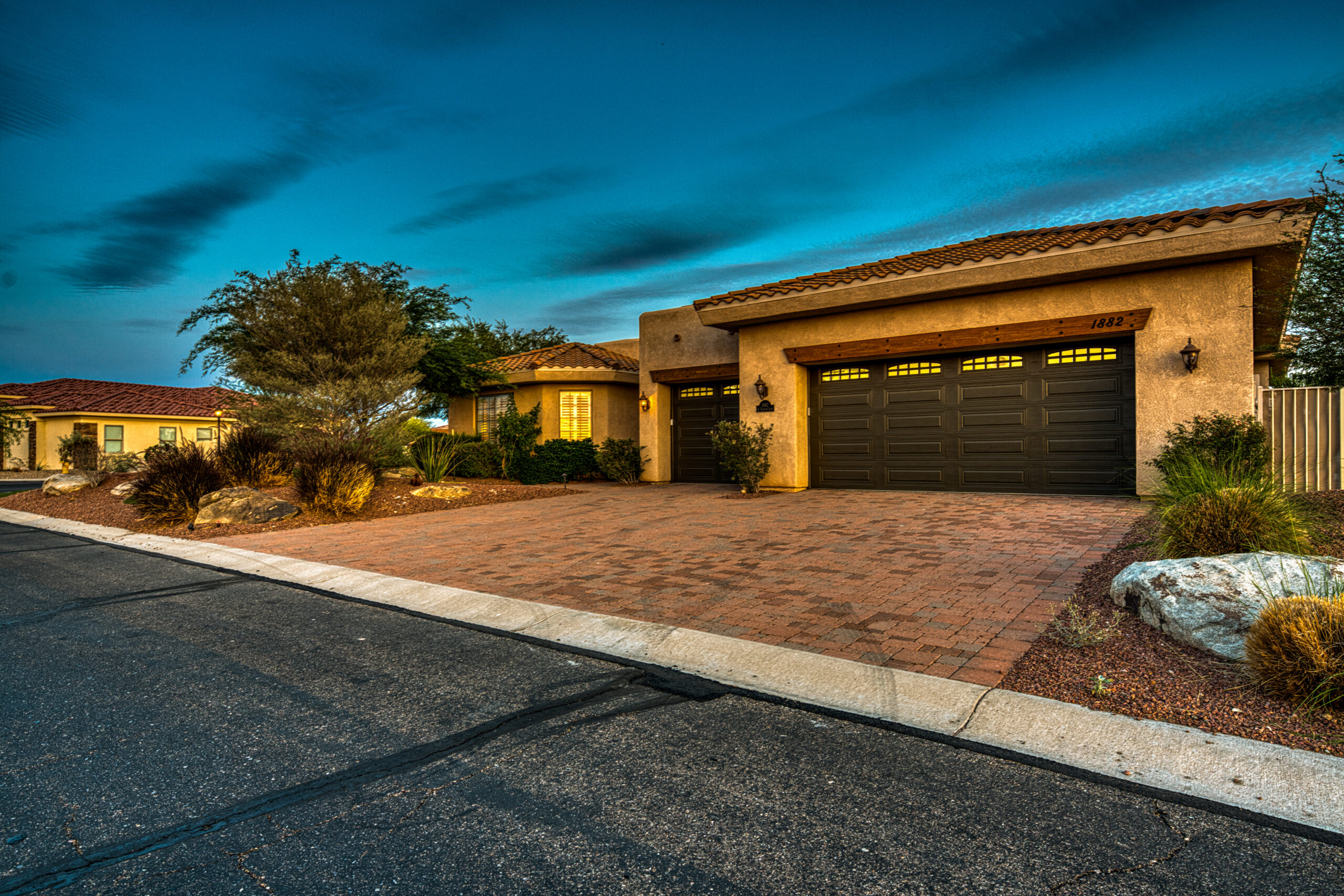 Front yard landscaping and curb appeal in daylight at Lake Havasu home