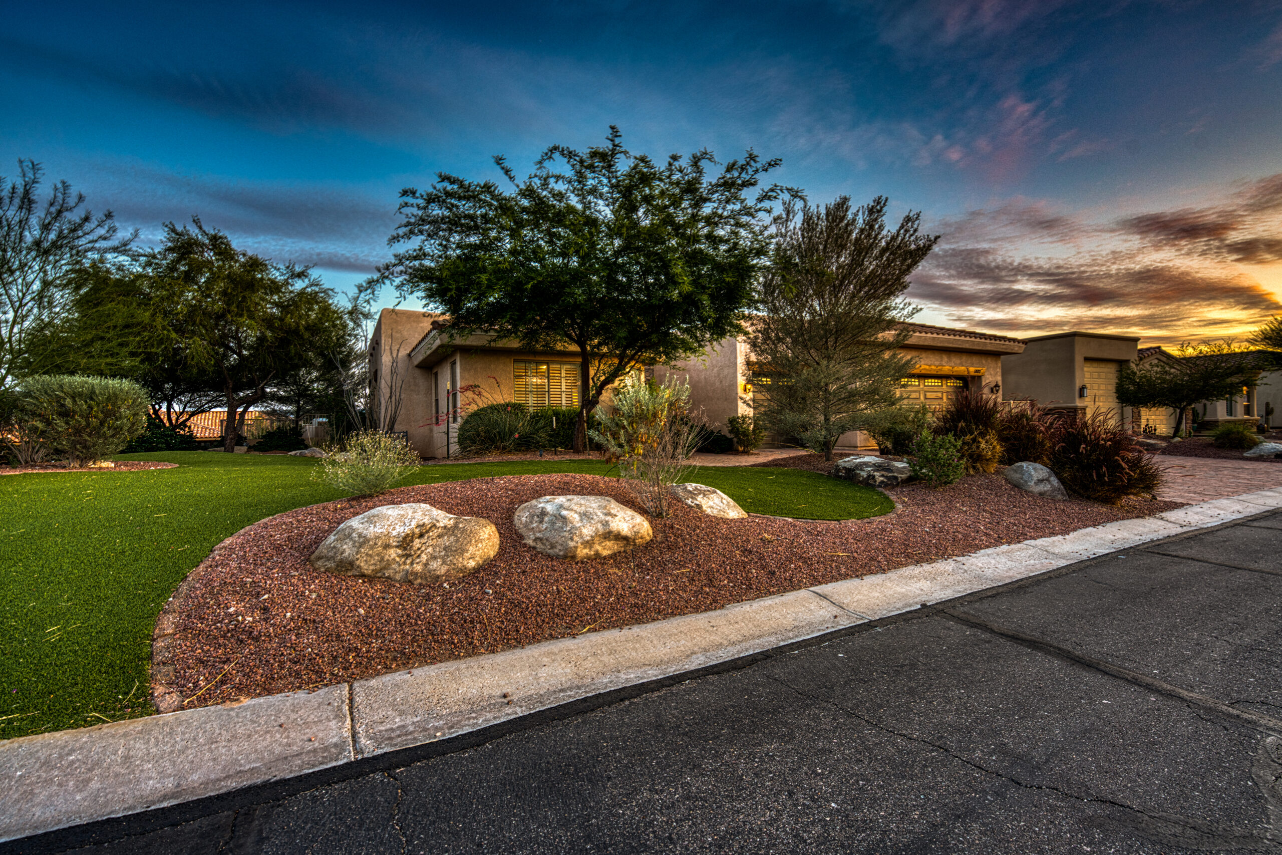 Front yard landscaping and curb appeal in daylight at Lake Havasu home